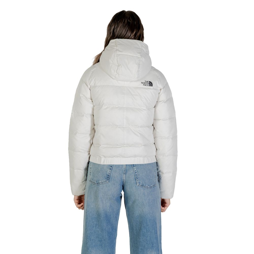 Hooded Overcoat by The North Face for women in nylon cream features an voluminous silhouette, showcasing distinct thermal, pockets, hooded & insulated and a voluminous hooded neckline for a truly voluminous aesthetic.
