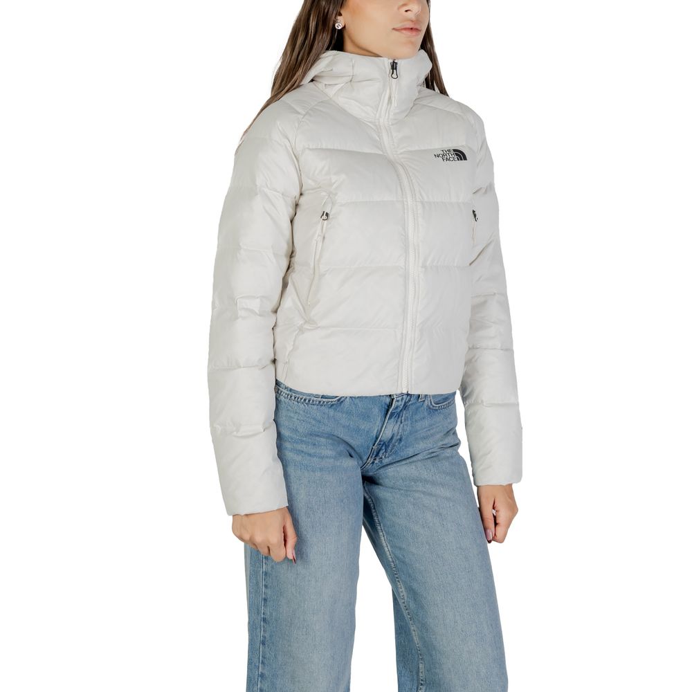Hooded Overcoat by The North Face for women in nylon cream presents a luxurious silhouette, showcasing a luxurious hooded neckline and sophisticated thermal, pockets, hooded & insulated for a premium, luxurious look.