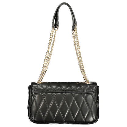 This Handbag by Twinset for women in polyurethane and black presents a sculptural silhouette featuring a secure snap, ample cardholder, and versatile handle for a sculptural finish.