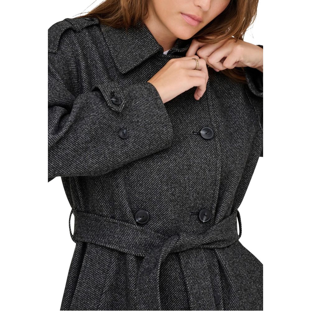 Trench Coat by Only for women in polyester gray presents an sculptural silhouette, artfully detailed with a sculptural and functional pockets for a truly sculptural finish.