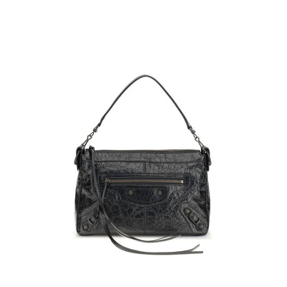 Small Shoulder Bag by Balenciaga for men in brass zamak & calf leather black features a stately silhouette, showcasing a secure zipper, ample , and stately shoulder-strap & adjustable-strap for a stately finish.