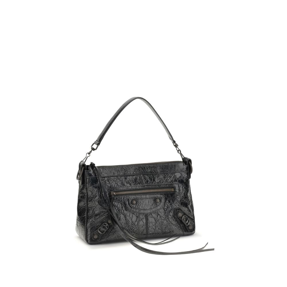Small Shoulder Bag by Balenciaga for men in brass zamak & calf leather black presents a statuesque silhouette, showcasing a secure zipper and statuesque with versatile shoulder-strap & adjustable-strap for a sophisticated look.