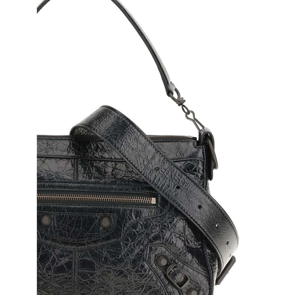 Small Shoulder Bag by Balenciaga for men in brass zamak & calf leather black features a effortless chic silhouette with a secure zipper, ample , and versatile shoulder-strap & adjustable-strap for a effortless chic finish.