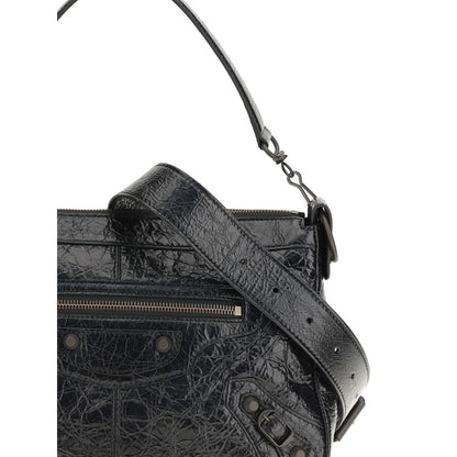 Small Shoulder Bag by Balenciaga for men in brass zamak & calf leather black features a effortless chic silhouette with a secure zipper, ample , and versatile shoulder-strap & adjustable-strap for a effortless chic finish.