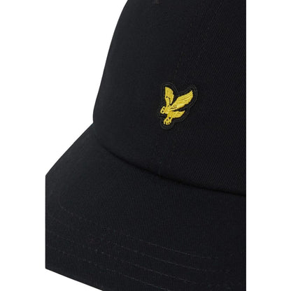 Hat by Lyle & Scott for men in cotton black showcases a refined silhouette, artfully capturing the essence of the refined Cotton Hat design for a sophisticated look.