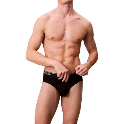 Underwear Briefs by Calvin Klein Underwear for men in stretch polyester black features an sleek silhouette that ensures a sleek fit, expertly capturing the sophisticated design of this Men's Stretch Polyester Briefs.