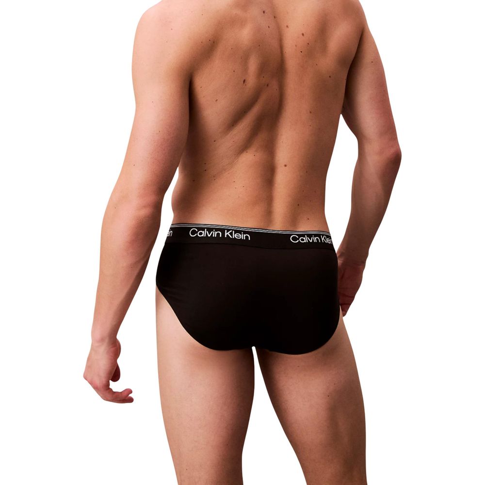 Underwear Briefs by Calvin Klein Underwear for men in stretch polyester black features an ergonomic silhouette, showcasing the ergonomic design of the Men's Stretch Polyester Briefs collection for a premium look and feel.