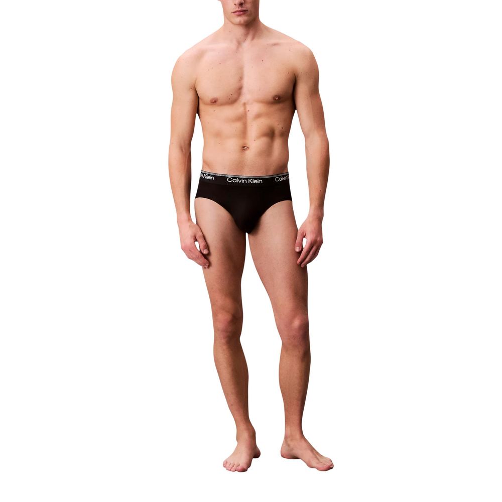 Underwear Briefs by Calvin Klein Underwear for men in stretch polyester black presents a ethereal silhouette, showcasing the sophisticated Men's Stretch Polyester Briefs design with a ethereal fit for a premium look.