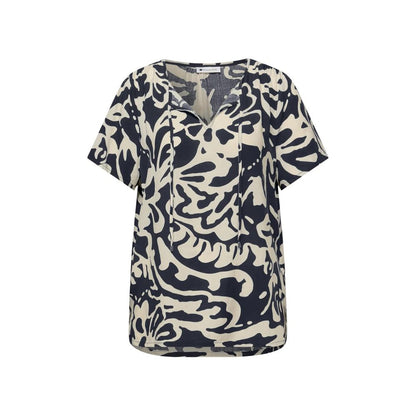 Shirt by Street One for women in viscose blue showcases a sleek silhouette, elegantly detailed with a sleek v-neck neckline and for a sleek finish.