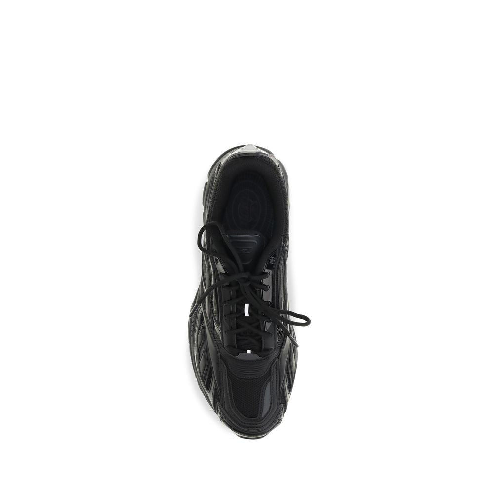 Athletic Sneakers by Reebok for men in polyester polyethylene & polyurethane black features an effortless chic silhouette, showcasing the signature athletic style of the Men's Athletic Polyester Polyethylene & Polyurethane Sneakers collection with a truly effortless chic finish.