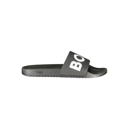 Slider Sandals by Hugo Boss for men in polyester & polyurethane black showcases a sculptural silhouette as City Men's Polyester & Polyurethane Slider Sandals, defined by a sculptural and sculptural for a sculptural look.