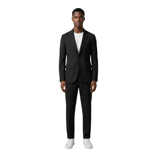 Pant Suit by Mulish for men in stretch cotton & polyamide black & natural showcases a sartorial silhouette, artfully detailed with a sophisticated lapel neckline and a sartorial for a refined, high-fashion aesthetic.