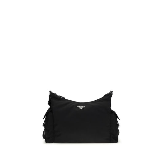 Shoulder Flap Bag by Prada for men in nylon black showcases a statuesque silhouette, artfully detailed with a secure snap, flap & zipper, organized , and versatile shoulder-strap & adjustable-strap for a statuesque look.