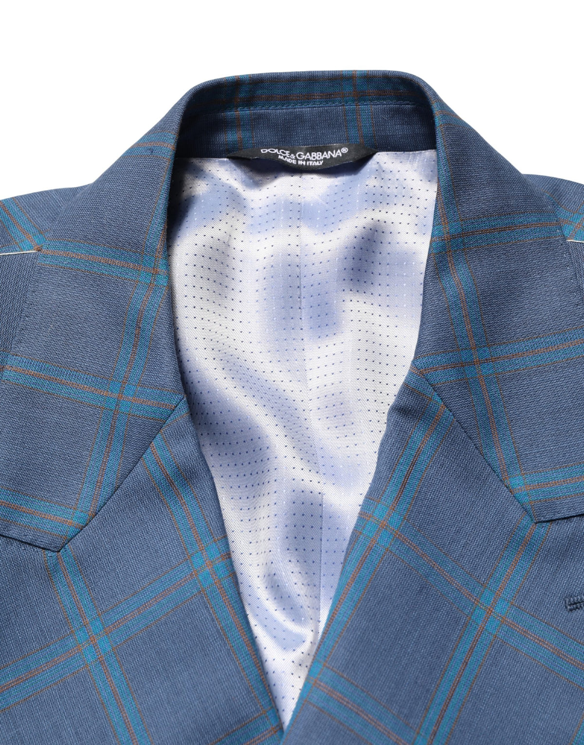 Blazer by Dolce & Gabbana for men in virgin wool viscose & acetate blue & checked features an sartorial silhouette, showcasing a sophisticated and sartorial for a truly sartorial finish.