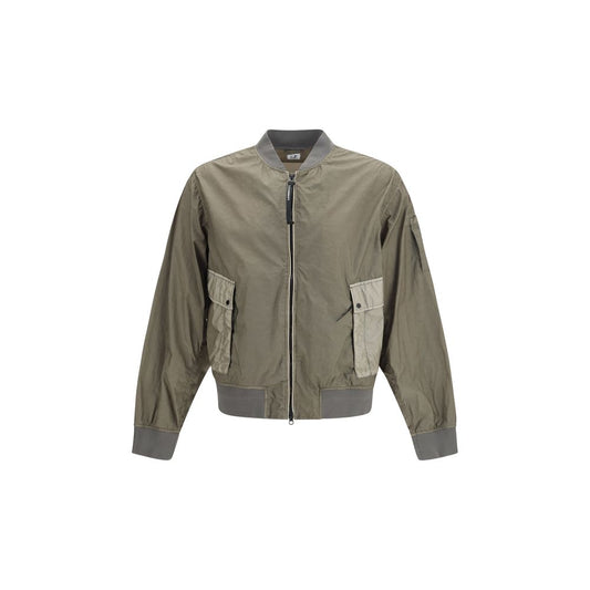 This Bomber Jacket by C.P. Company for men in nylon polyamide polyurethane & velour bicolour exhibits a edgy silhouette, meticulously detailed with functional pockets and a edgy for a edgy finish.