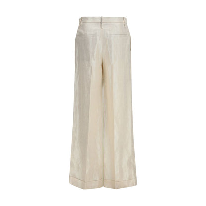 Trousers by Brunello Cucinelli for women in linen & silk beige & natural presents a perennial silhouette, meticulously tailored with a straight-leg & regular-fit cut, long finish, and an elegant high rise.