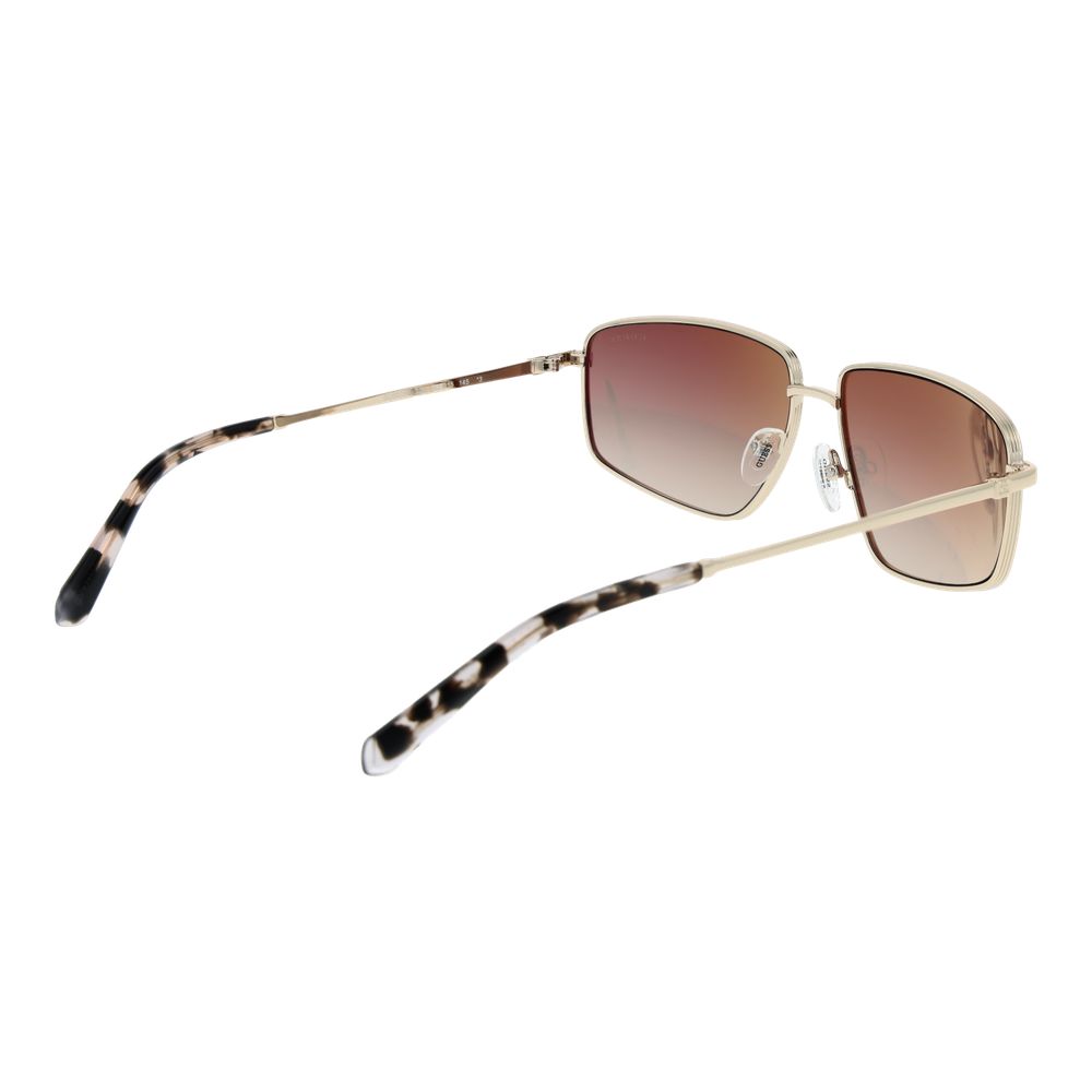 Sunglasses by Guess for women in metal and gold featuring an opulent rectangle full-rim frame design with a sophisticated gold coloured frame finish and high-performance gradient category-3-dark-tint lens.
