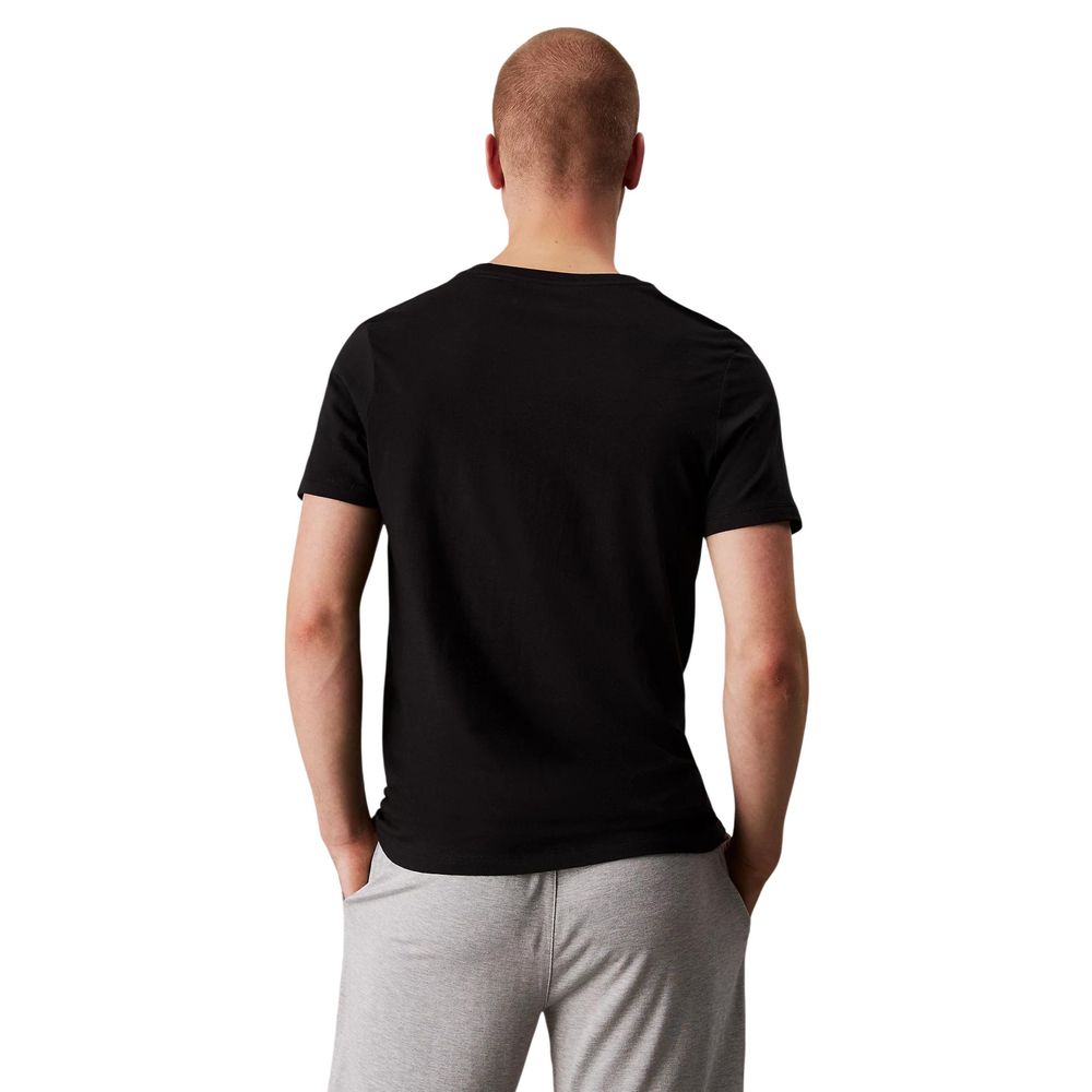Tank Top by Calvin Klein Underwear for men in cotton gray showcases a streamlined Men's Crew-Neck Cotton Tank Top design with a streamlined and crew neckline.