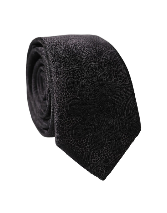 Necktie by Dolce & Gabbana for men in silk black showcases a stately silhouette, expertly detailed with a stately finish that perfectly captures the sophisticated essence of the Aria Silk Necktie.