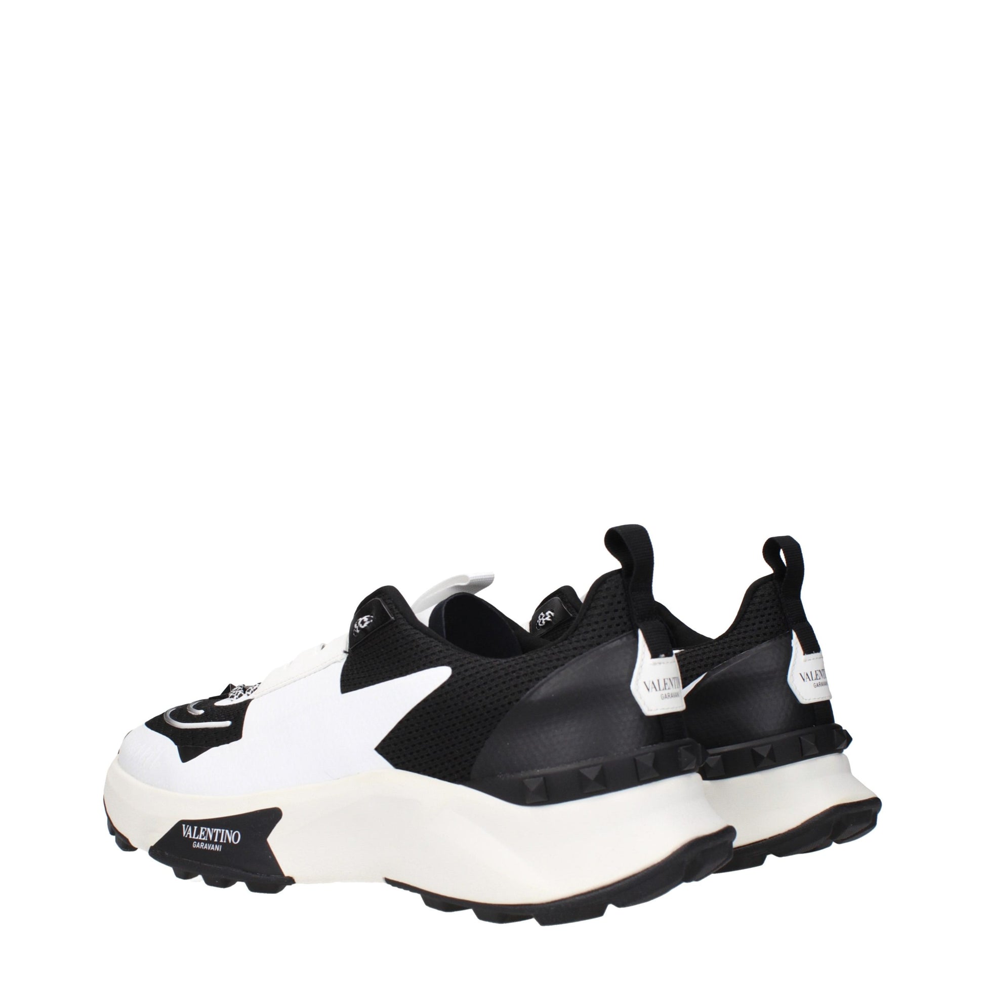 Athletic Sneakers by Valentino Garavani for men in fabric black showcases a architectural silhouette, artfully capturing the essence of the Men's Athletic Fabric Sneakers with its signature architectural athletic style construction.