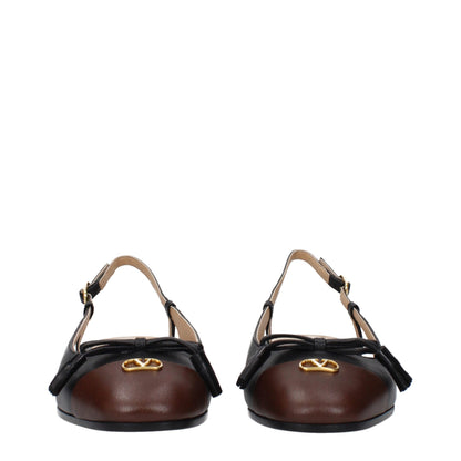 Ballet Flat Shoes by Valentino Garavani for women in leather black & gold features an captivating silhouette, showcasing the captivating style of the Women's Leather Ballet Flat Shoes with its distinct and refined round toe style.