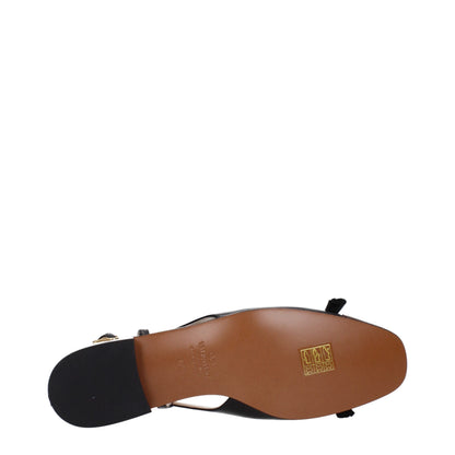 Ballet Flat Shoes by Valentino Garavani for women in leather black & gold showcases a resplendent Women's Leather Ballet Flat Shoes aesthetic with a and round toe style.