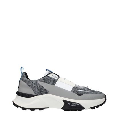 Athletic Sneakers by Valentino Garavani for men in fabric gray showcases an impeccable silhouette, defined by an impeccable athletic style design that perfectly captures the essence of the Men's Athletic Fabric Sneakers.