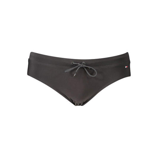 Swim Briefs by Tommy Hilfiger for men in stretch polyester black features a refined silhouette, showcasing the refined design of this Men's Stretch Polyester Swim Briefs with a refined fit.