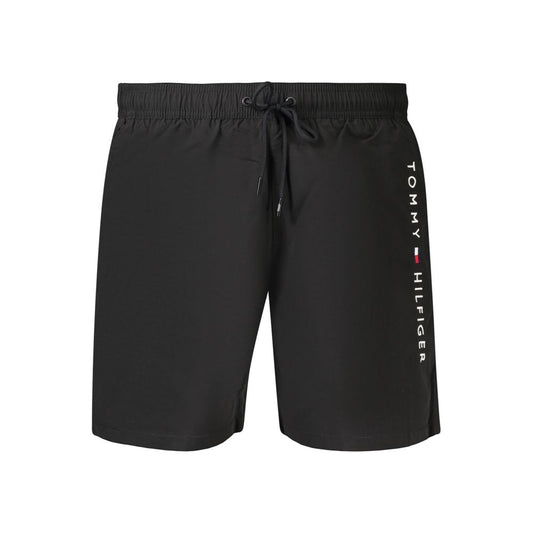Swim Shorts by Tommy Hilfiger for men in polyester black features an dramatic silhouette that defines the luxurious aesthetic and refined cut of the Men's Polyester Swim Shorts.
