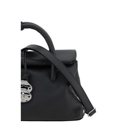 Shoulder Bag by Zanellato for women in bos taurus calf leather black features a statuesque silhouette, showcasing a secure hook and statuesque built-in-compartments with versatile shoulder-strap, adjustable-strap & handle for a statuesque finish.