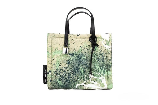 Mini Crossbody Travel Tote Handbag by Marc Jacobs for women in raffia & leather green, multicolor, silver & print features a versatile chic silhouette, meticulously detailed with a secure zipper, ample , and versatile crossbody-strap, adjustable-strap, detachable-strap & handle.