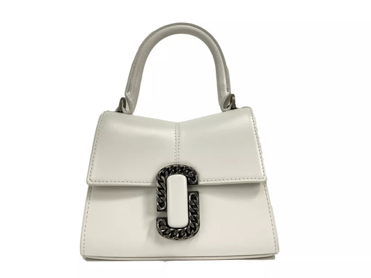 Mini Crossbody Satchel Handbag by Marc Jacobs for women in leather silver & white features a versatile chic silhouette, meticulously detailed with a secure magnetic, ample cardholder, and versatile crossbody-strap, handle, adjustable-strap & detachable-strap.