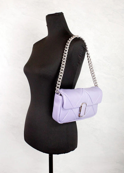 Medium Quilted Crossbody Travel Handbag by Marc Jacobs for women in leather purple, silver & signature features a multifaceted silhouette, showcasing a secure zipper & magnetic and multifaceted with versatile crossbody-strap, shoulder-strap, adjustable-strap & detachable-strap for multifaceted style.