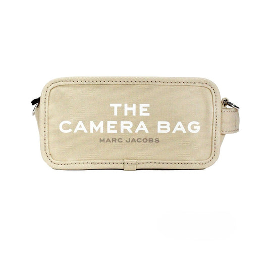 Small Travel Crossbody Camera Handbag by Marc Jacobs for women in stretch cotton modal canvas beige, black & silver features a transformative elegance silhouette, showcasing a secure zipper, organized , and versatile crossbody-strap, adjustable-strap & detachable-strap for a transformative elegance look.