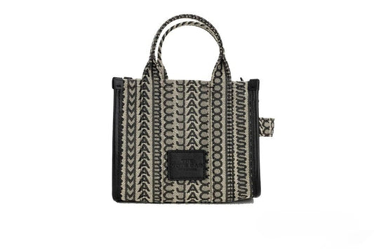 Mini Crossbody Travel Tote Handbag by Marc Jacobs for women in calfskin leather & nylon beige, silver, patterned, jacquard & monogram features an multi-faceted design with a secure zipper, ample cardholder, and versatile crossbody-strap, adjustable-strap, detachable-strap & handle for a multi-faceted finish.