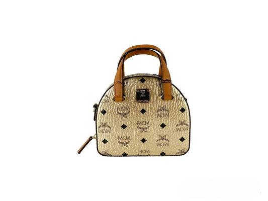 Mini Half Moon Crossbody Tote Handbag by MCM for women in leather gold & signature features a transformative elegance silhouette, showcasing a secure zipper, organized cardholder, and versatile crossbody-strap, adjustable-strap & detachable-strap for a transformative elegance look.