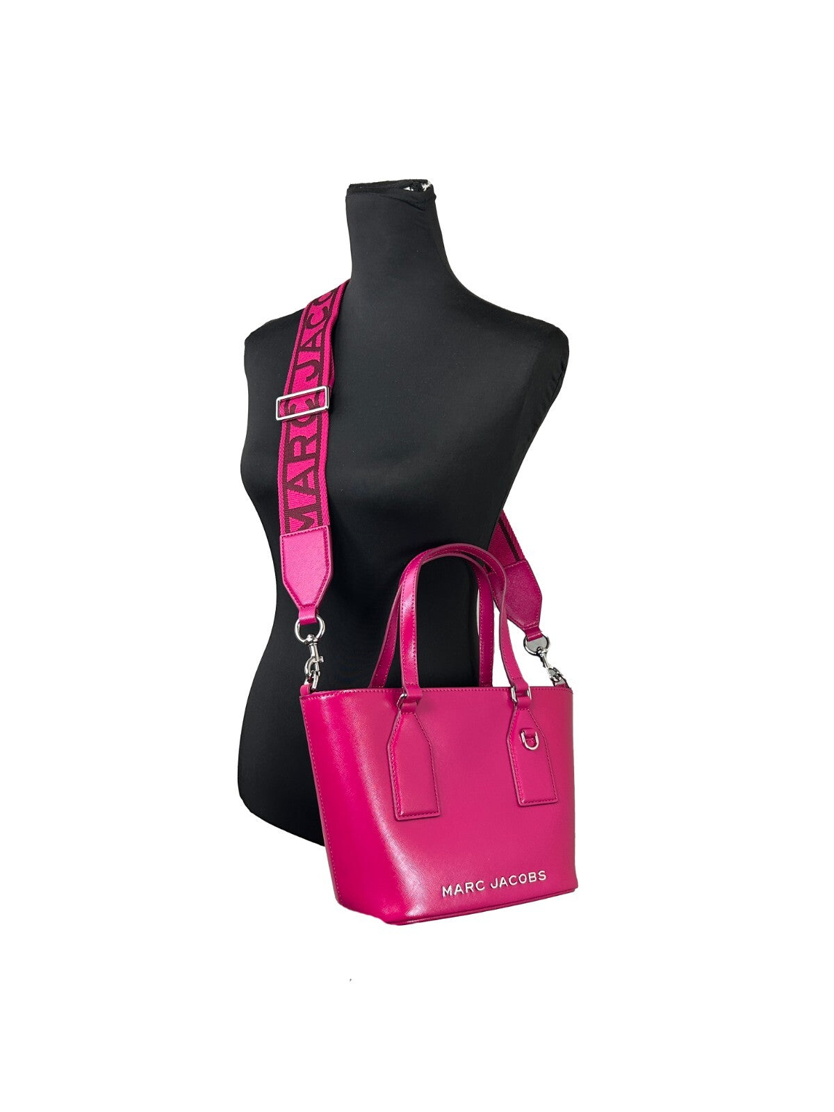 Small Crossbody Handbag by Marc Jacobs for women in saffiano leather pink, silver & patterned features a transformative elegance silhouette, showcasing a secure zipper, organized , and versatile crossbody-strap, adjustable-strap, detachable-strap & handle for a transformative elegance look.