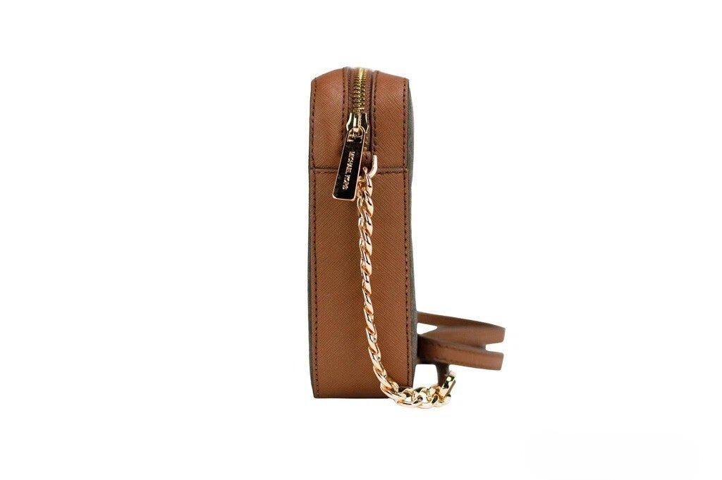Large 2-in-1 Shoulder & Crossbody East West Messenger Bag by Michael Kors for men in leather & velvet beige, brown & gold showcases a artisanal Jet Set Leather & Velvet Large 2-in-1 Shoulder Crossbody East West Messenger Bag design, featuring a secure zipper and ample with versatile crossbody-strap, shoulder-strap & adjustable-strap for a artisanal look.