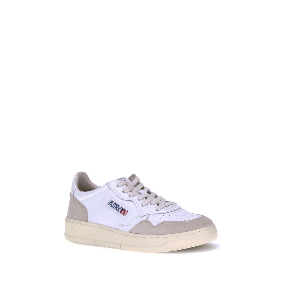 Sneakers by Autry for men in bos taurus calf suede leather white & signature features an timeless silhouette from the Men's Low Top Bos Taurus Calf Suede Leather Sneakers collection, showcasing a signature low-top style with an timeless finish.