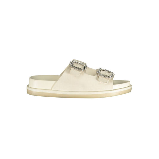 Flat Sandals by Laura Biagiotti for women in polyethylene & rhinestone and white presents a sculptural silhouette, showcasing the signature style of the Women's Polyethylene & Rhinestone Flat Sandals with a sculptural flat and sculptural .