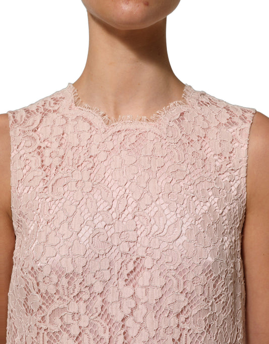 Dress by Dolce & Gabbana for women in cotton silk viscose & lace powder-pink & floral features an magnificent silhouette, artfully detailed with a magnificent round wrap neckline and sleeveless that flows into an magnificent short mini.