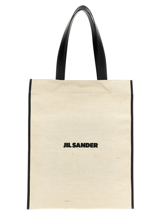 Medium Shopper Tote Bag by Jil Sander for women in cotton polyester & horn bicolour, black, white & print features an jet-setting Cotton Polyester & Horn Medium Shopper Tote Bag design with a secure , jet-setting , and versatile handle for a jet-setting look.