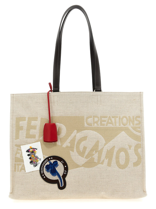 Tote Bag by Ferragamo for women in calfskin leather beige & jacquard features a jet-set Calfskin Leather Tote Bag design, complete with a secure , ample , and versatile handle for a jet-set look.