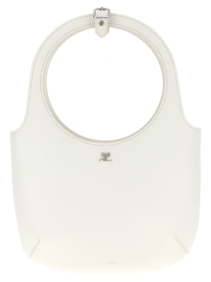 Handbag by Courrèges for women in bos taurus calf suede leather white features an refined silhouette, showcasing a secure magnetic, ample , and versatile shoulder-strap, adjustable-strap & handle for a sophisticated refined aesthetic.