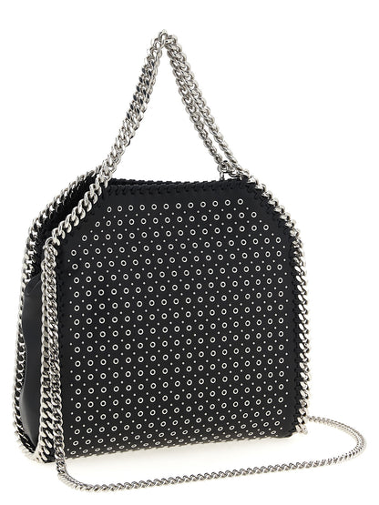 Mini Handbag by Stella McCartney for women in faux patent leather black presents a ornamental silhouette, showcasing a secure magnetic, ample , and versatile shoulder-strap & handle for a ornamental finish.