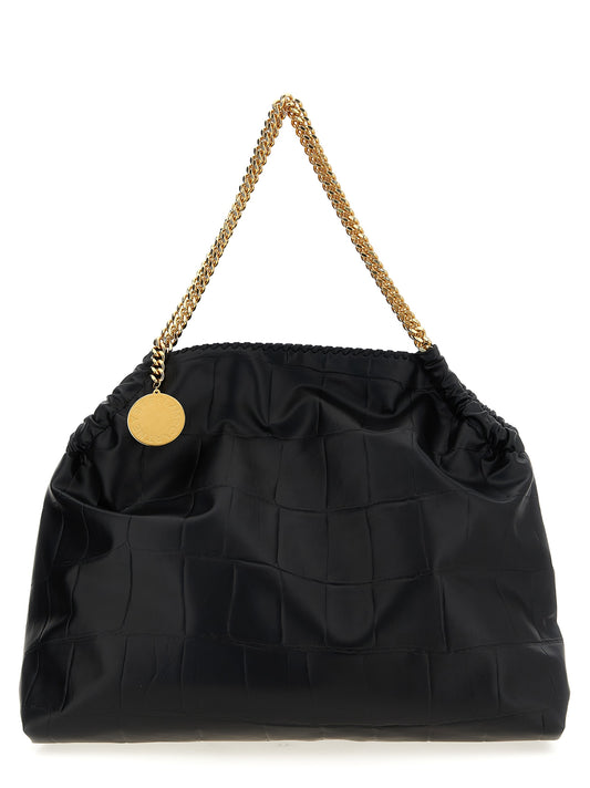 Shopper Tote Bag by Stella McCartney for women in calf leather & aluminium black & monogram features an jet-set-ready silhouette, showcasing the Falabella The Monogram Calf Leather & Aluminium Shopper Tote Bag design with a secure magnetic, ample , and versatile handle.