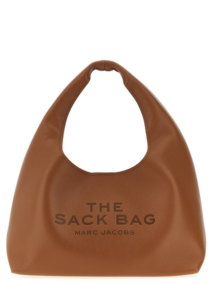 Medium Shoulder Clutch Bag by Marc Jacobs for women in bos taurus calf suede leather brown features a stately silhouette, showcasing a secure magnetic, ample , and stately shoulder-strap & handle for a stately finish.