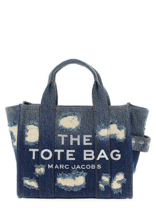 Small Tote Bag by Marc Jacobs for women in polyester & denim cotton blue & print features an jet-set Polyester & Denim Cotton Small Tote Bag design with a secure zipper, ample , and versatile shoulder-strap, adjustable-strap & handle for an jet-set finish.