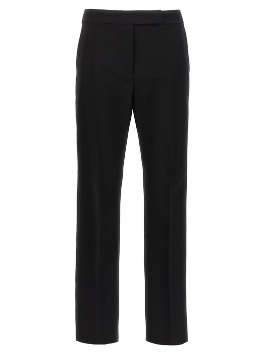 Trousers by Max Mara for women in satin mohair virgin wool black presents a perennial silhouette, meticulously tailored with a cut, long finish, and an elegant .