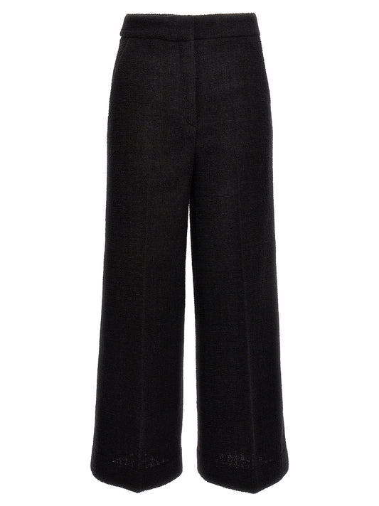 Chinos Pants by Moschino for women in polyamide wool black features an perennial cropped and cropped, expertly tailored with a perennial for a refined silhouette.